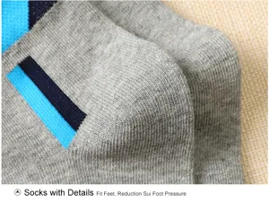 Close-up view of men's grey cotton mid-tube socks featuring blue and dark blue stripe details.