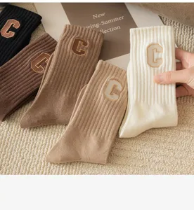 Comfortable cotton ribbed crew socks with stylish C embroidery, perfect for autumn and winter daily wear.