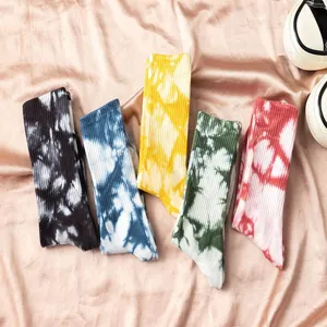 Tie-dye mid-calf socks for street style and skateboard fashion, comfy unisex design.