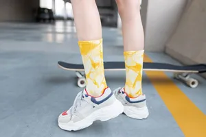 Street style tie-dye mid-calf socks for women and men, trendy sports skater socks design.