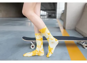 Yellow and white tie-dye crew socks for street style skate wear, unisex comfortable cotton athletic socks.