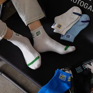 Trendy men's short socks low-cut cotton casual sports socks with stylish letter embroidery.
