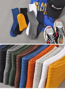 Men's casual ribbed crew socks, soft cotton breathable solid color fashion socks detail view.
