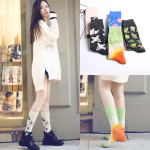 Stylish streetwear crew socks with vibrant floral and gradient patterns for men and women.
