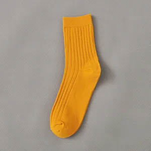 Men's casual sports breathable cotton mid-tube socks with vertical stripes in bright yellow.