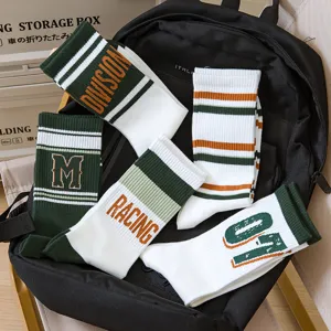 Stylish mid-calf sports socks for men and teens, breathable cotton athletic striped socks.