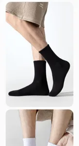 Chaussettes mi-mollet côtelées noires pour hommes, chaussettes de sport respirantes au quotidien.