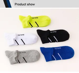Details of athletic short socks with moisture-wicking fabric, multi-color display and stripes.