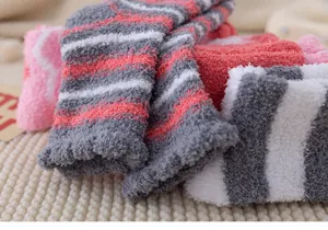 Cozy coral fleece winter warm socks, thick plush striped sleep socks for women indoor use.