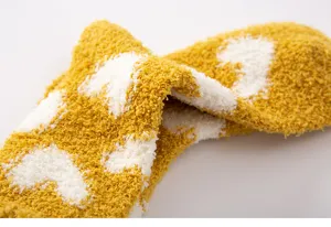 Thickened warm winter coral fleece socks with cute heart pattern for cozy home indoor wear.