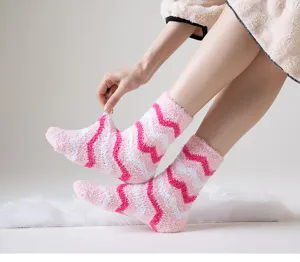 Cozy pink fuzzy coral velvet floor socks with cute chevron pattern, soft and warm for home.