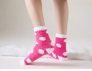 Cozy pink polka dot fuzzy coral fleece socks for women, soft warm winter home floor socks.
