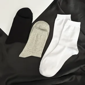 Herren einfarbige mittlere Baumwollsocken lässig schwarz weiß Business Socken Hauptansicht