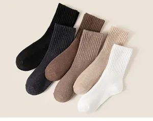 Thickened mid-tube thermal socks in various colors, comfortable and warm winter essentials.