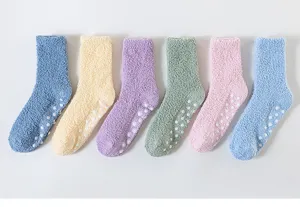 Detail view of soft cozy fuzzy winter floor socks with anti-slip dots in multiple pastel colors.