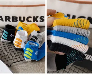 Men short cotton socks detail view, colorful striped ankle socks, casual sportswear.