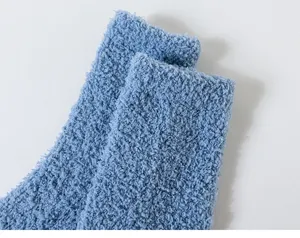 Cozy blue coral fleece mid-tube socks detail, thick warm fuzzy home floor socks for winter.