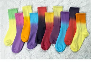 Close-up detail shot of colorful tie-dye gradient mid-tube socks, soft cotton fabric texture.