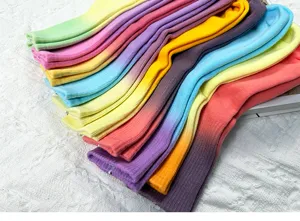Close-up detail of colorful gradient tie-dye cotton mid-tube socks, soft and breathable fabric.