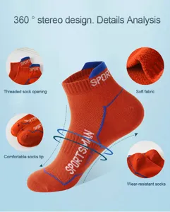 Detailed view of men's athletic short cotton socks in bright orange with blue ribbed cuffs.