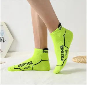 Neon green athletic ankle socks detail view, breathable mesh design for men sports.