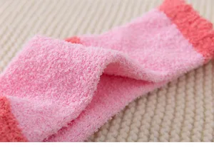 Cozy coral fleece socks for women, winter warm plush fuzzy sleeping home socks detail.