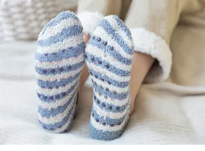 Cozy fluffy winter home floor socks for women, thick warm plush socks with anti-slip silicone soles.