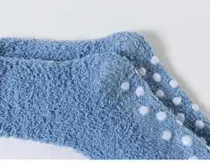 Cozy coral fleece winter floor socks with anti-slip dots, soft warm fuzzy home socks for adults.