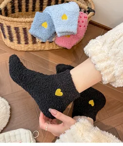 Cozy coral fleece women socks with cute heart embroidery, soft mid tube home floor socks.