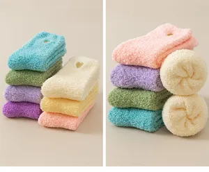 Cozy fluffy coral fleece socks for women, thick warm winter fuzzy sleep floor socks with heart detail.