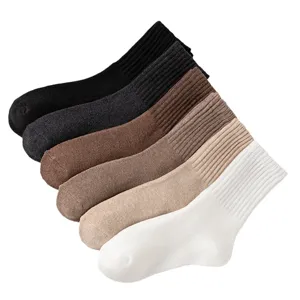 Solid color ribbed winter thermal socks, thick cozy crew socks for men and women daily wear.