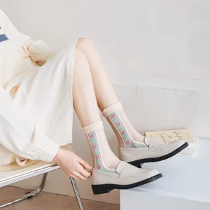 Sheer heart pattern detail on stylish summer socks, featuring soft fabric and vertical stripes.