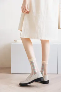 Sheer thin summer women socks featuring cute pink hearts and green vertical stripe patterns.