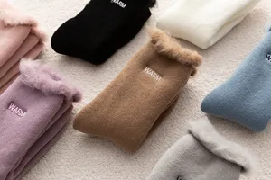 Cozy plush-lined winter women socks with warm embroidery, soft thick thermal socks for cold days.