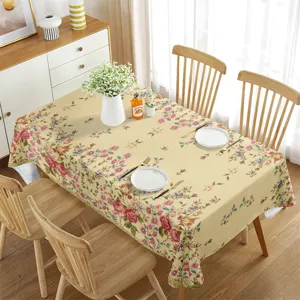 Vista detallada del mantel rectangular floral impermeable con hermosas rosas rosas.