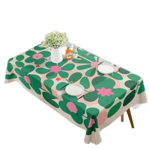 Mantel rectangular impermeable con moderno patrón floral abstracto verde y rosa para comedor.