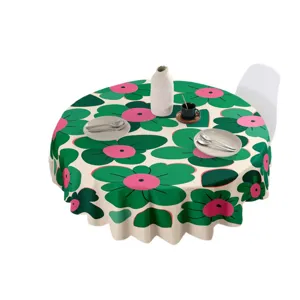 Mantel redondo impermeable con estampado floral verde y rosa para la decoracion del hogar.