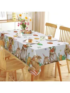 Escena de mesa de Pascua con mantel rectangular impermeable con conejitos y huevos lindos.