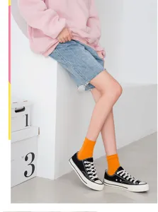 Japanese style candy color women mid tube socks comfortable solid color casual hosiery.