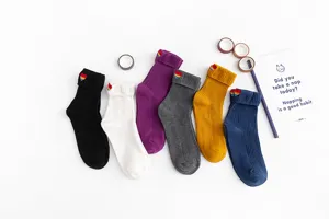 Japanese style cotton mid-tube socks with rainbow heart embroidery, colorful daily wear.