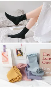 Ruffled mid-tube socks women Japanese style solid color cute stacking socks daily casual wear detail.