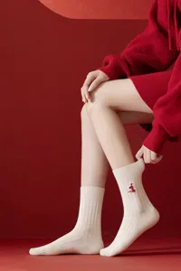 Year of the Snake red knit mid-tube socks for women, cozy and stylish daily wear.