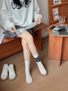 Japanese style college socks for women, fashionable white mid-calf socks with black three stripes.