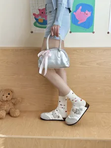 Cute Japanese style mid-calf socks featuring lovely embroidered letters and a soft cotton blend.