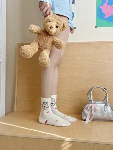 Cute bear print women mid-tube socks detail shot, soft cotton material, casual daily wear style.