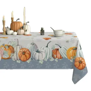Nappe rectangulaire imperméable avec motif de citrouilles d'automne pour la décoration de table.