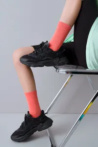 Women's bright orange crew socks, trendy spring and summer casual candy-colored mid-tube hosiery.