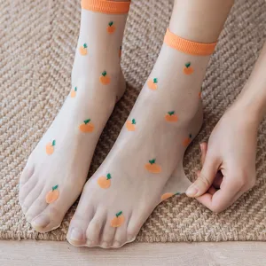 Chaussettes en soie de verre transparente pour femmes avec joli motif d'orange et bon confort