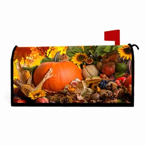Close-up detail of autumn pumpkin and sunflower mailbox cover, festive outdoor yard decor.