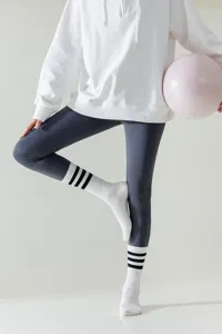 White yoga socks for women, breathable long sports socks for fitness, pilates and running.